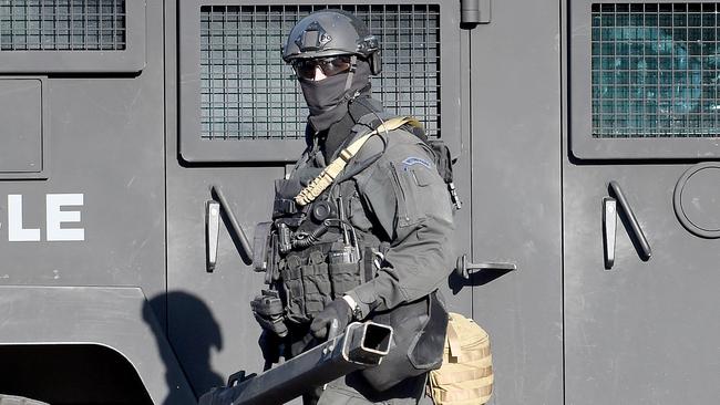 SOG police conducting a raid. Picture: Nicole Garmston