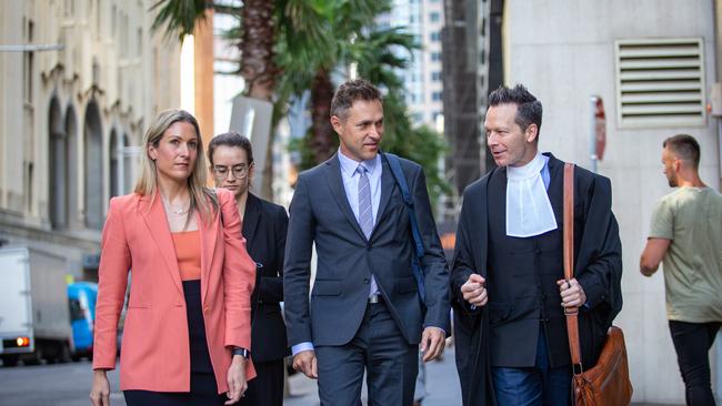 Network 10 Producer Angus Llewellyn with his legal team. Picture: NCA NewsWire / Christian Gilles