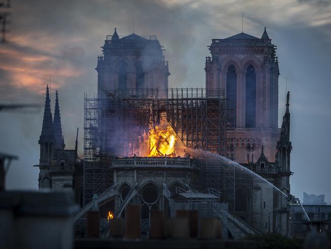 Smoke and flames rise from Notre-Dame Cathedral on April 15, 2019 in Paris, France. (Photo by Veronique de Viguerie/Getty Images)