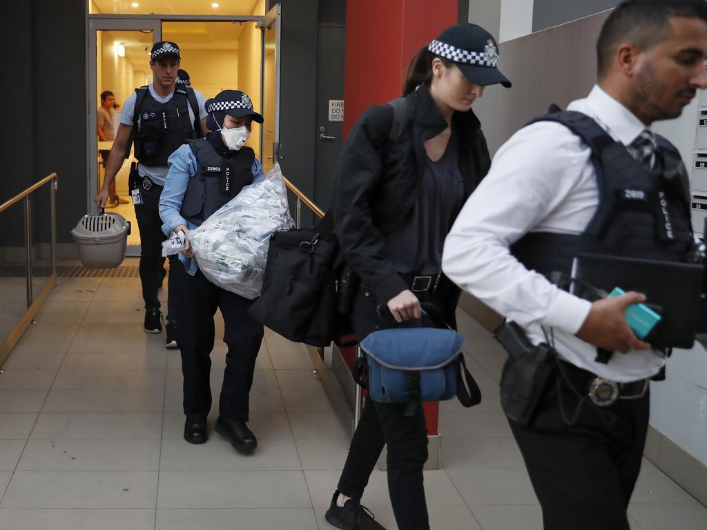 Australian Federal Police raid an apartment in Sydney relation to a $10m NDIS fraud. Picture: Toby Zerna