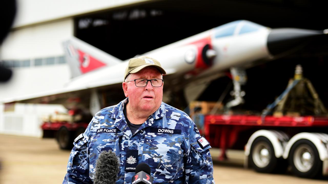 Two restored Royal Australian Air Force aircraft veterans- a Mirage fighter jet A3-55 and a Winjeel Trainer??? A85-403 - arrived at Townsville RAAF Base. WO Mike Downs speaks to media. Picture: Alix Sweeney