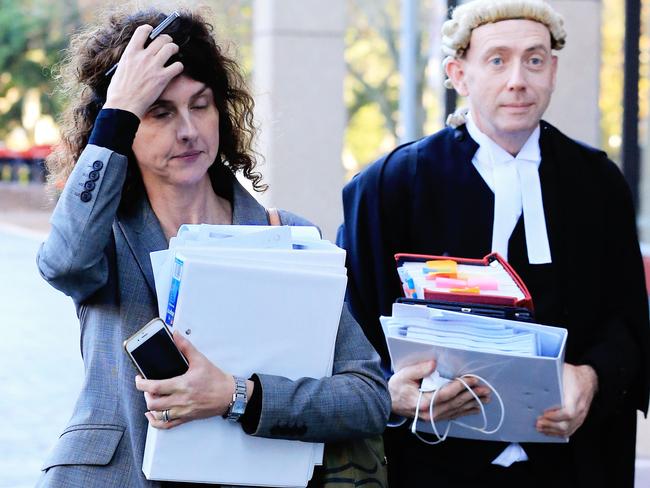 Lawyers for Channel 7 emerge from court after fighting off an injunction. Picture: Jenny Evans