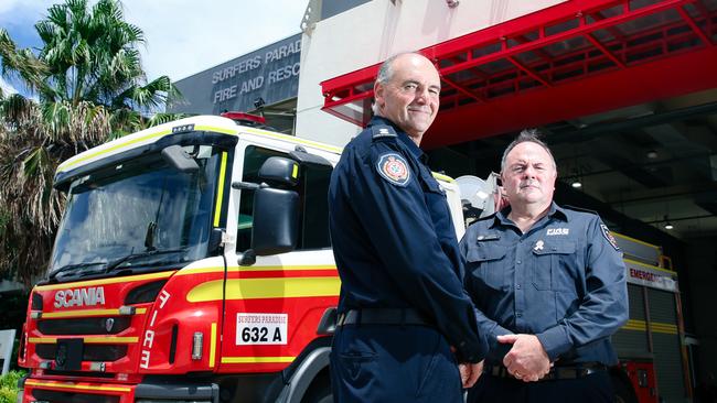 Raymond Ware and Michael Evans are among the few remaining officers who witnessed the tragic Southport Honda fire that claimed the lives of two of their fellow firefighters. Picture: Glenn Campbell