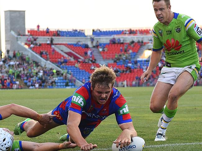 Cory Denniss scores against the Raiders.