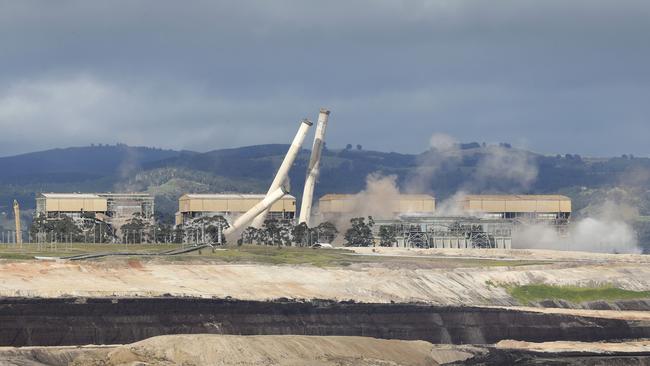 The chimneys start to fall to the ground. Picture: David Caird