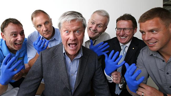 Leading sportsmen Brett Ogle, Tim Watson, Andrew Gaze, Mark Skaife and Danny Allsopp glove up to give David Parkin a quick check up. The men are all teaming up to support prostate cancer research and show it impacts on men in all walks of life and backgrounds during the Australian Prostate Research Centre. Photo David Caird.