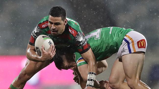 Cody Walker of the Rabbitohs is tackled during the round 11 NRL match between the Canberra Raiders and the South Sydney Rabbitohs at GIO Stadium on July 25. (Photo by Mark Metcalfe/Getty Images)