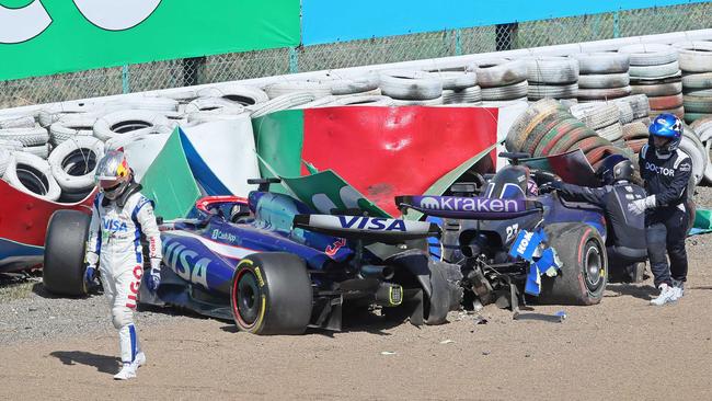 Daniel Ricciardo crashing out in Japan. Photo by JIJI PRESS / AFP.