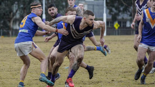 EFL: Templestowe’s Jai Hardwick powers through the pack. Picture: Valeriu Campan