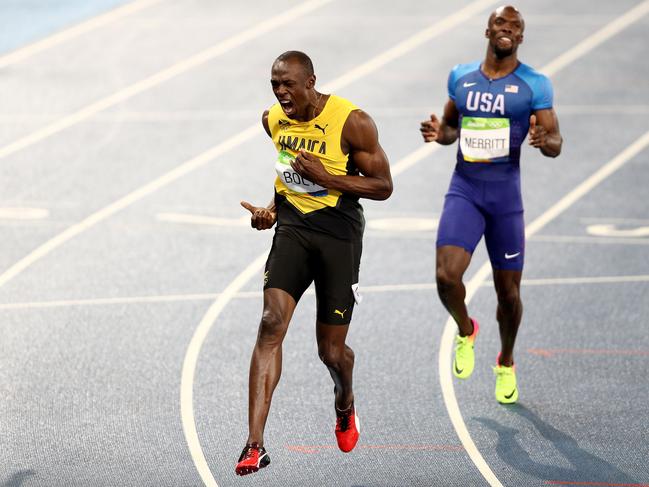 RIO DE JANEIRO, BRAZIL - AUGUST 18: Usain Bolt of Jamaica celebrates winning the MenÂ’s 200m Final on Day 13 of the Rio 2016 Olympic Games at the Olympic Stadium on August 18, 2016 in Rio de Janeiro, Brazil. (Photo by Paul Gilham/Getty Images)