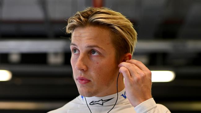 ABU DHABI, UNITED ARAB EMIRATES - DECEMBER 08: Liam Lawson of New Zealand and Visa Cash App RB prepares to drive in the garage prior to the F1 Grand Prix of Abu Dhabi at Yas Marina Circuit on December 08, 2024 in Abu Dhabi, United Arab Emirates. (Photo by Rudy Carezzevoli/Getty Images)