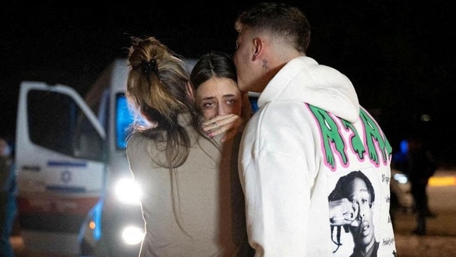 Mia Schem, a woman held hostage by Hamas, was reunited with her family at an Israeli military base in November. Picture: Reuters