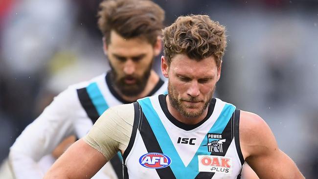 Brad Ebert and Justin Westhoff show their disappointment after the loss to Collingwood. Picture: Quinn Rooney/Getty Images