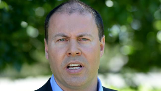 Energy Minister Josh Frydenberg talks to the media in Melbourne, Sunday, December 10, 2017. (AAP Image/Mal Fairclough) NO ARCHIVING