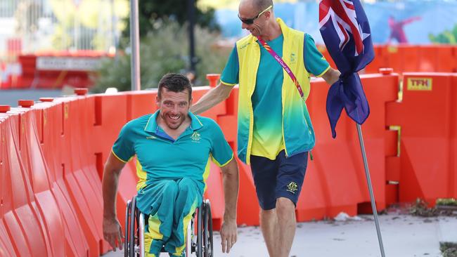 2018 Commonwealth Games on the Gold Coast in QLD. The Closing Ceremony flag bearer announcement at the Athletes Village. Retiring gold medal wheelchair marathon champion Kurt Fearnley is the flag bearer. Steve Moneghetti.  Picture: Alex Coppel.