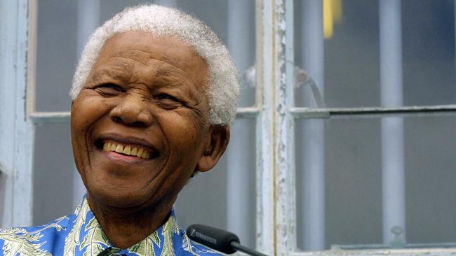 Former South African President Nelson Mandela during a press conference in front of his former prison cell on Robben Island in 2003.