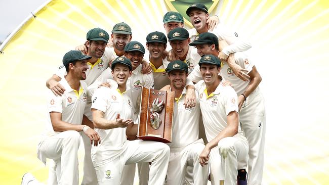 Victorious Australian players celebrate with the trophy after winning the Test series against Sri Lanka. Picture: Getty Images