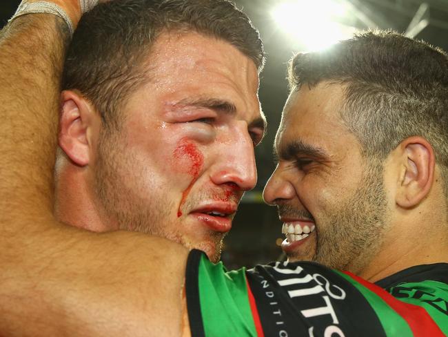 SYDNEY, AUSTRALIA - OCTOBER 05: Sam Burgess and Greg Inglis of the Rabbitohs celebrate victory during the 2014 NRL Grand Final match between the South Sydney Rabbitohs and the Canterbury Bulldogs at ANZ Stadium on October 5, 2014 in Sydney, Australia. (Photo by Mark Kolbe/Getty Images)