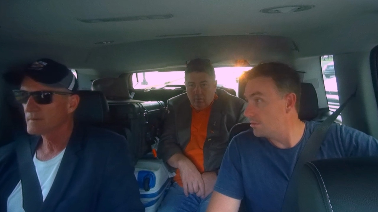 Rodger Muller (centre) pictured in the car with One Nation’s Steve Dickson (left) and James Ashby (right) en route to meet the NRA. Source: Al Jazeera