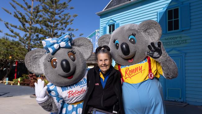 Jenny Johnston 69, who has been a cleaner at Dreamworld for 35 years, with park favourites, Belinda and Kenny. Picture: David Kelly