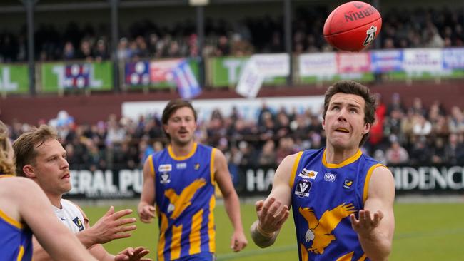 Liam Gruar under the ball. He’s crossed from Somerville to Tyabb. Picture: Valeriu Campan