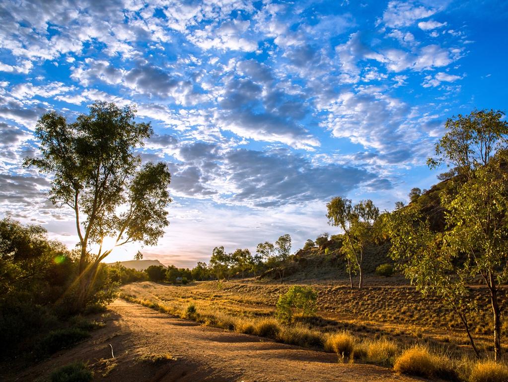 The sun setting on the running track in Alice Springs where a young woman was grabbed. Photo: Emma Murray