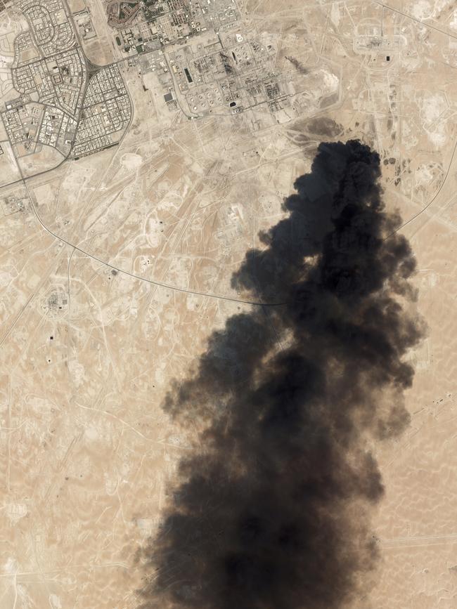 This satellite image shows thick black smoke rising from Saudi Aramco's Abqaiq oil processing facility in Buqyaq. Picture: AP