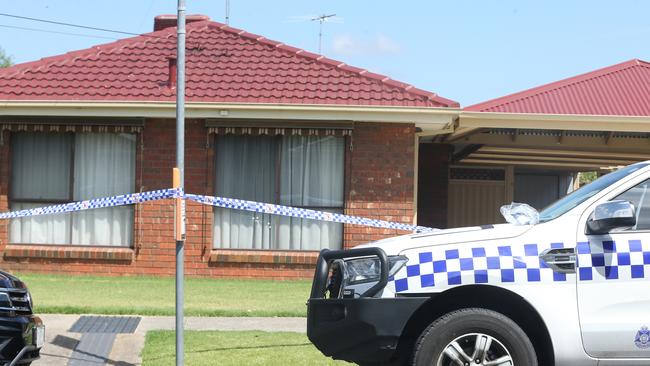 Police at the scene of a house fire in Princess Street, Corio on Monday. Picture: Alan Barber