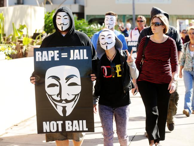 Anonymous protesters outside Mackay Courthouse during a rape case in 2014. Picture: Mark Calleja