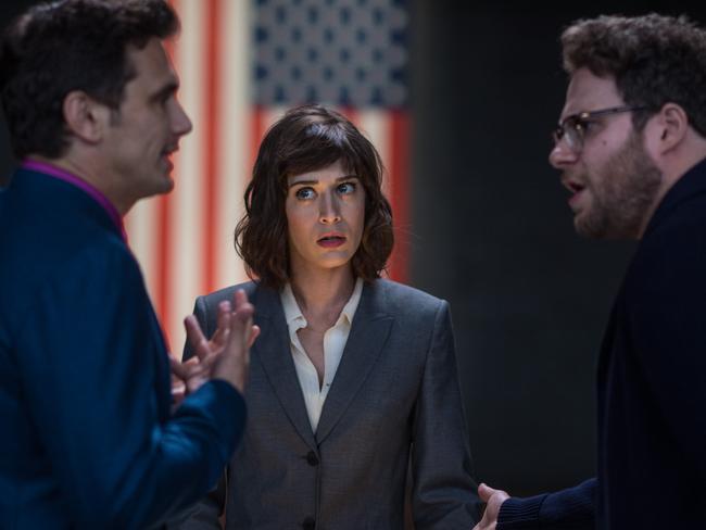 Controversial film ... Lacey (Lizzy Caplan) with Dave (James Franco) and Aaron (Seth Rogen) in The Interview.