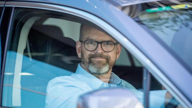 Simon Overland leaves a Whittlesea Council meeting. Picture: Jake Nowakowski.