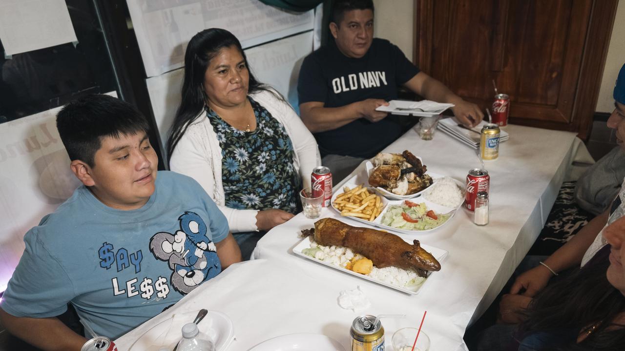 Diners prepare to tuck into a cuy feast. “It’s better than chicken. Better than rabbit,” manager Lucio Barrera told The Post, adding that he considers the head the best part. Picture: Courtesy Stefano Giovannini for New York Post