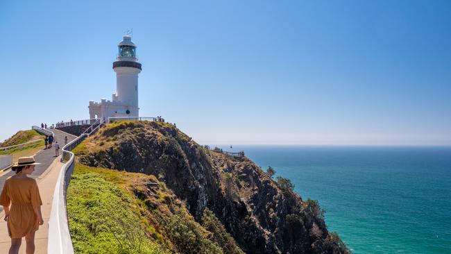 Tourists take in the sights from the Byron Bay lighthouse.