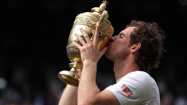 Andy Murray celebrates his three-set win over Milos Raonic of Canada at Wimbledon. Picture: Clive Brunskill/Getty Images