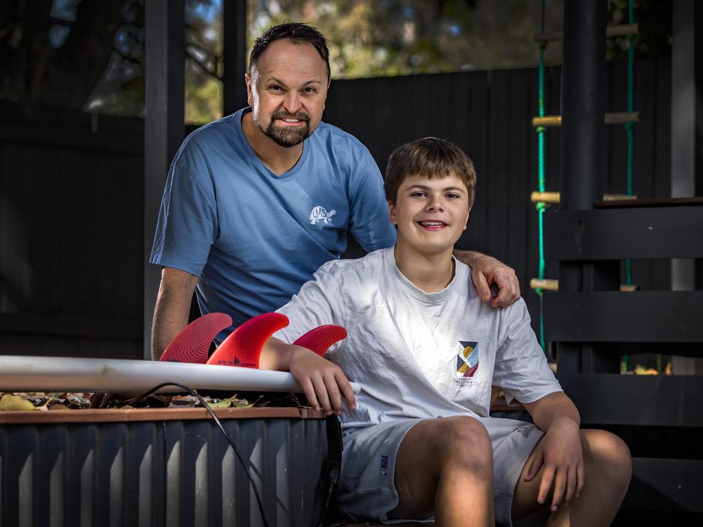 *** Strictly embargoed until Wednesday 23/8 *** Steven Bradbury who is receiving a bravery award for helping save the four drowning teens at a Caloundra beach on March 5, 2022.
Steven Bradbury also pictured with his 13-year-old son Flyn who was involved with the rescue.
Picture: Nigel Hallett