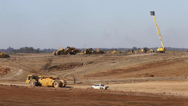 Earthmoving equipment fills the landscape as works continue at the Badgerys Creek construction site of the Western Sydney Airport. Picture: John Appleyard