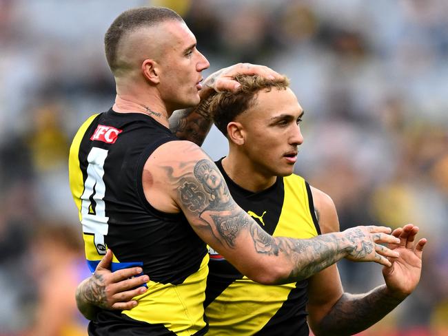 MELBOURNE, AUSTRALIA - MAY 06: Shai Bolton of the Tigers is congratulated by Dustin Martin after kicking a goal during the round eight AFL match between Richmond Tigers and West Coast Eagles at Melbourne Cricket Ground, on May 06, 2023, in Melbourne, Australia. (Photo by Quinn Rooney/Getty Images)