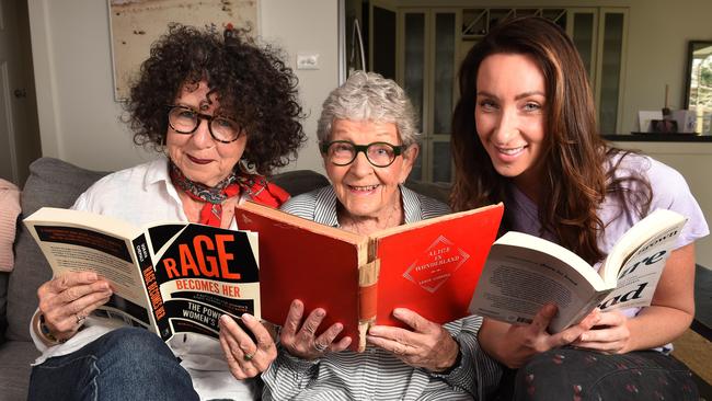 Gogglebox stars the Silbery family: Emmie — gran, Kerry — mum and Isabelle — daughter on the couch they’re known for watching TV on with their favourite books. Picture: Tony Gough