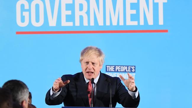 British Prime Minister and leader of the Conservative Party Boris Johnson speaks to supporters and press as the Conservatives celebrate a sweeping election victory on December 13, 2019 in London. Picture: Getty Images