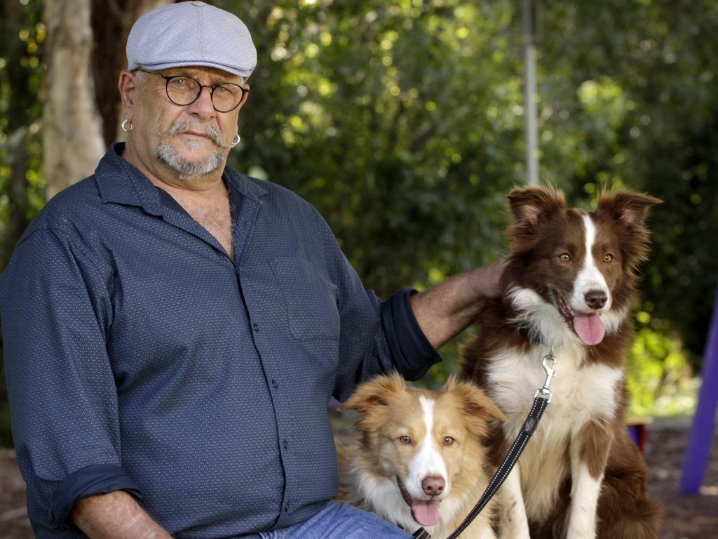 Best-selling author, Guy Hull, and his dogs. Picture: News Regional Media