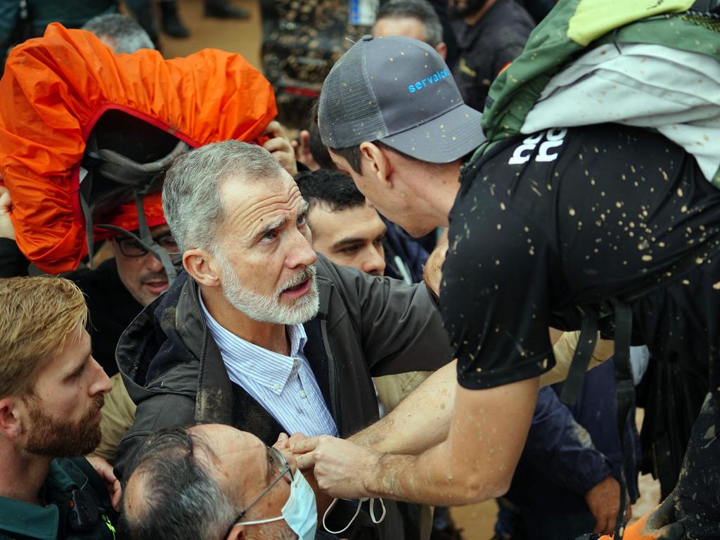 King Felipe and other members of the official delegation were heckled by Paiporta residents, with some shouting "assassins" and others throwing mud, according to AFP journalists on the scene. Picture: Manaure Quintero/AFP