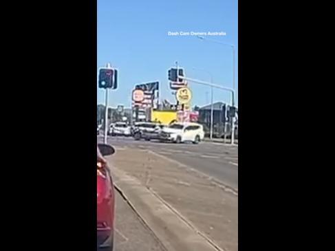 Police car smashes into Townsville driver