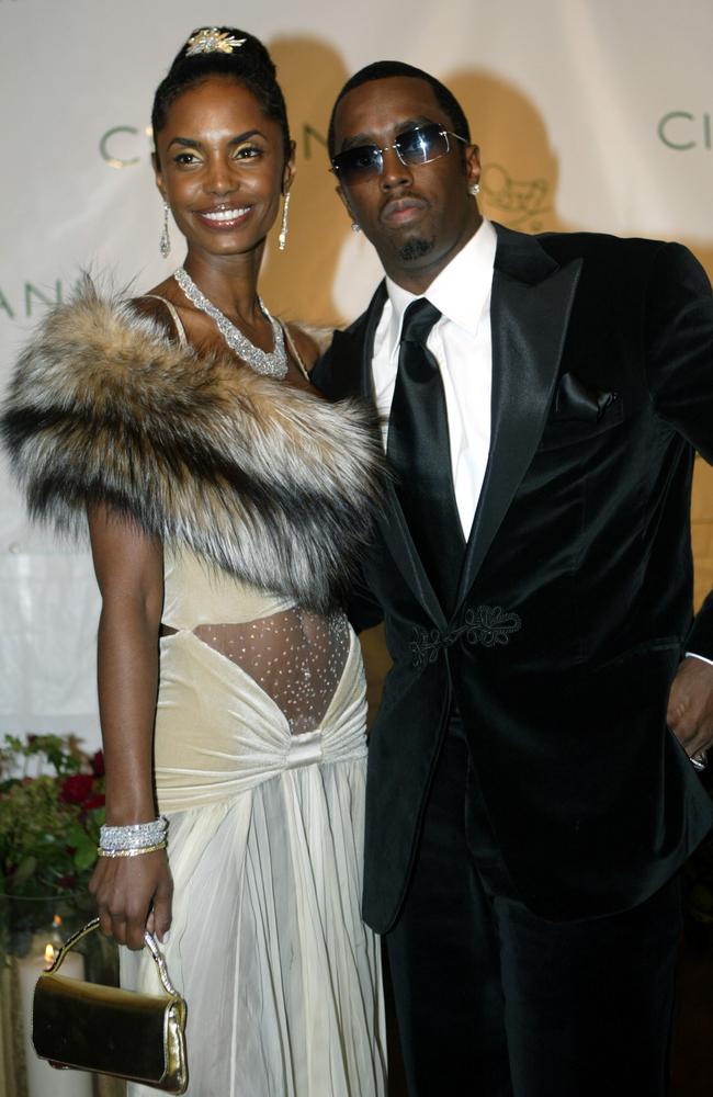 Sean 'Diddy' Combs and Kim Porter, left, in 2004, as they arrived for Combs' 35th birthday celebration in New York. Picture: AP