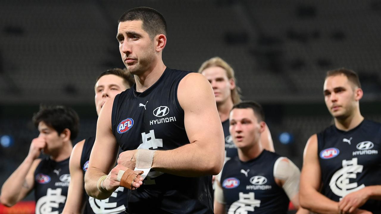 Jacob Weitering and his dejected teammates after losing to GWS. Picture: Quinn Rooney/Getty Images