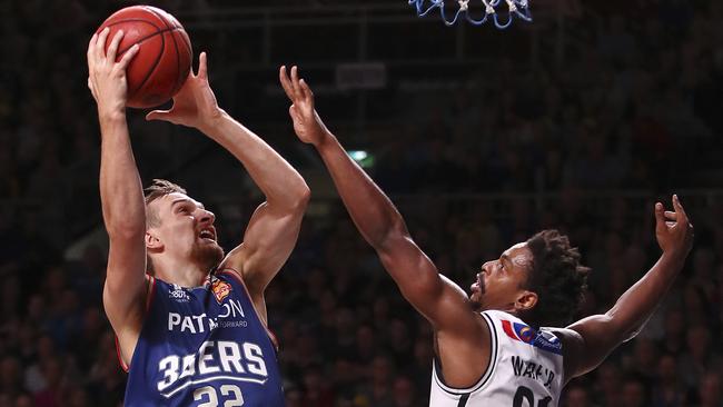 Anthony Drmic drives to the basket on Casper Ware during the NBL grand final against Melbourne. Picture: Sarah Reed.