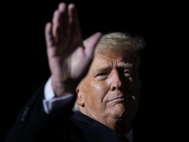 VANDALIA, OHIO - NOVEMBER 07: Former U.S. President Donald Trump waves at the end of a rally at the Dayton International Airport on November 7, 2022 in Vandalia, Ohio.Â Trump is in Ohio campaigning for Republican candidates, including U.S. Senate candidate JD Vance, who faces U.S. Rep. Tim Ryan (D-OH) in tomorrow's general election.   Drew Angerer/Getty Images/AFP