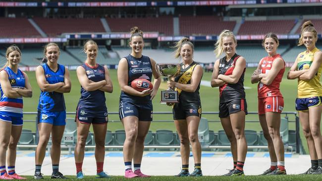 SANFL Women's League captains at the Adelaide Oval for Wednesday’s 2022 Season Launch. Shelby Smith (Central District), Maya Rigter (Sturt), Ali Ferrall (Norwood), Bri Wedding (South Adelaide), Ellie Kellock (Glenelg), Madi Russell (West Adelaide), Erin Sundstrom (North Adelaide) and Amie Blanden (Eagles). Picture: SANFL