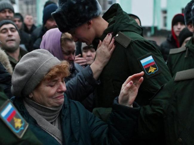 Conscripts say their farewells to family and friends as they leave Omsk earlier this month. Picture: ALEXEY MALGAVKO/REUTERS/The Times