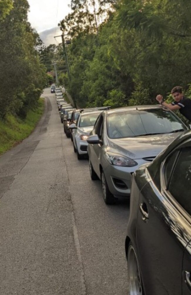 The queue at the Indooroopilly Covid testing clinic at 5.15am. Picture: Iris Verbaant