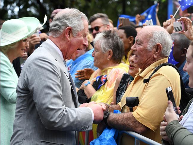 Prince Charles (second left) and the Duchess of Cornwall (left) are greeted by the public during a visit to Brisbane. Picture: Dan Peled/AAP